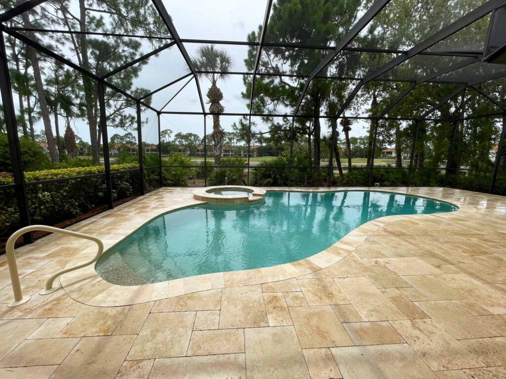 caged pool and lanai after pressure washing 34105