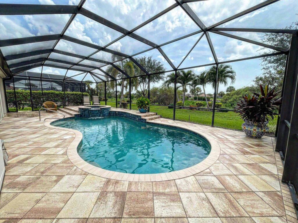 beautiful back yard and pool after pressure washing in Naples 34105
